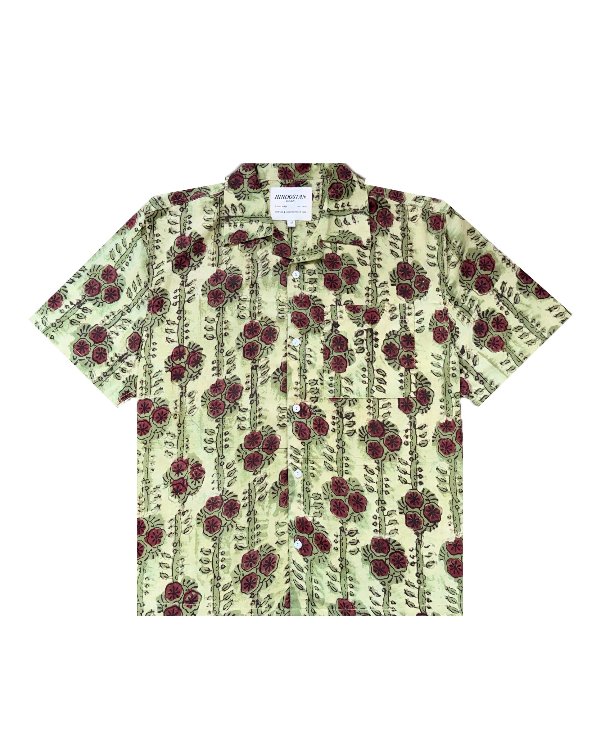 Short-sleeve shirt with floral pattern on a white background