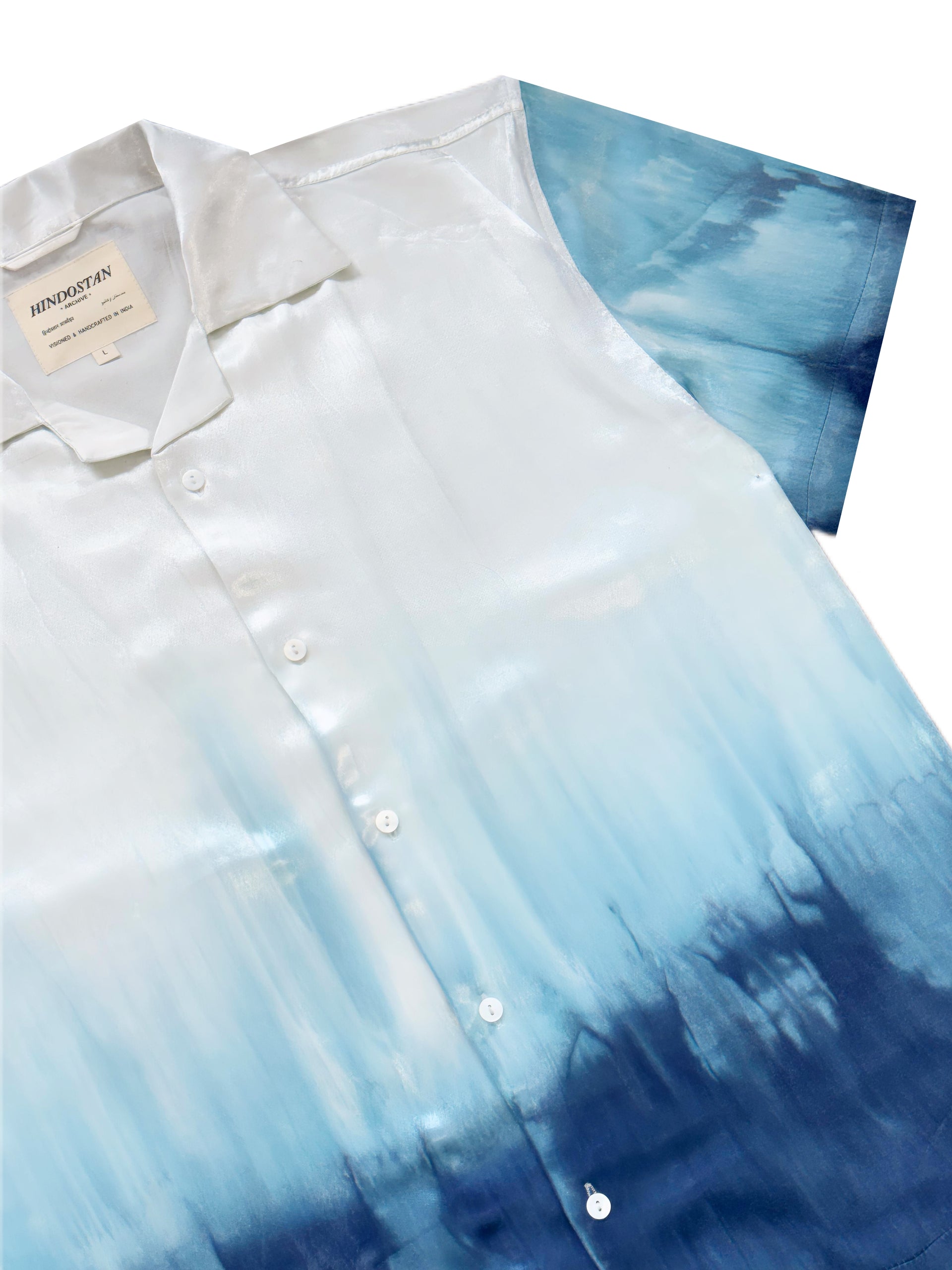 White shirt with blue gradient sleeves on a white background