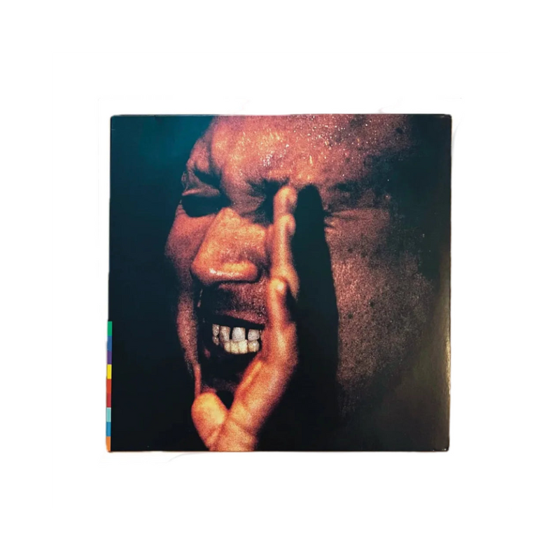 Album cover with a person holding their hand to their mouth on a white background