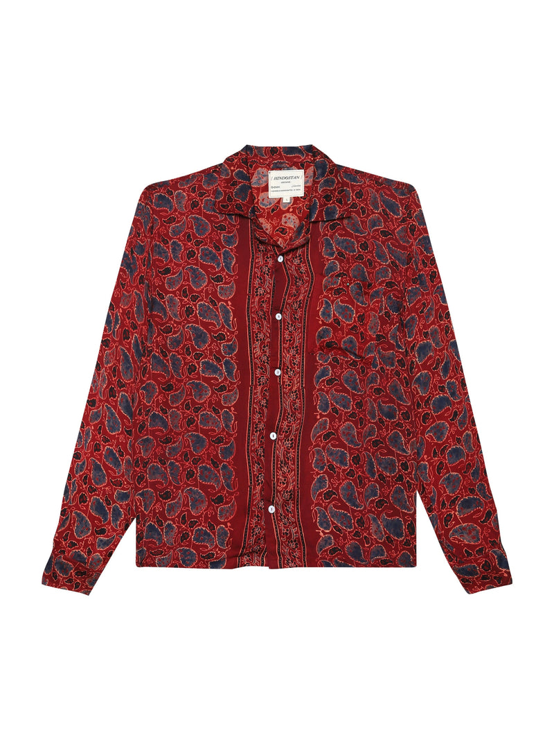 A maroon silk shirt with an intricate hand-blocked Ajrakh print featuring floral border, displayed flat on a white background.