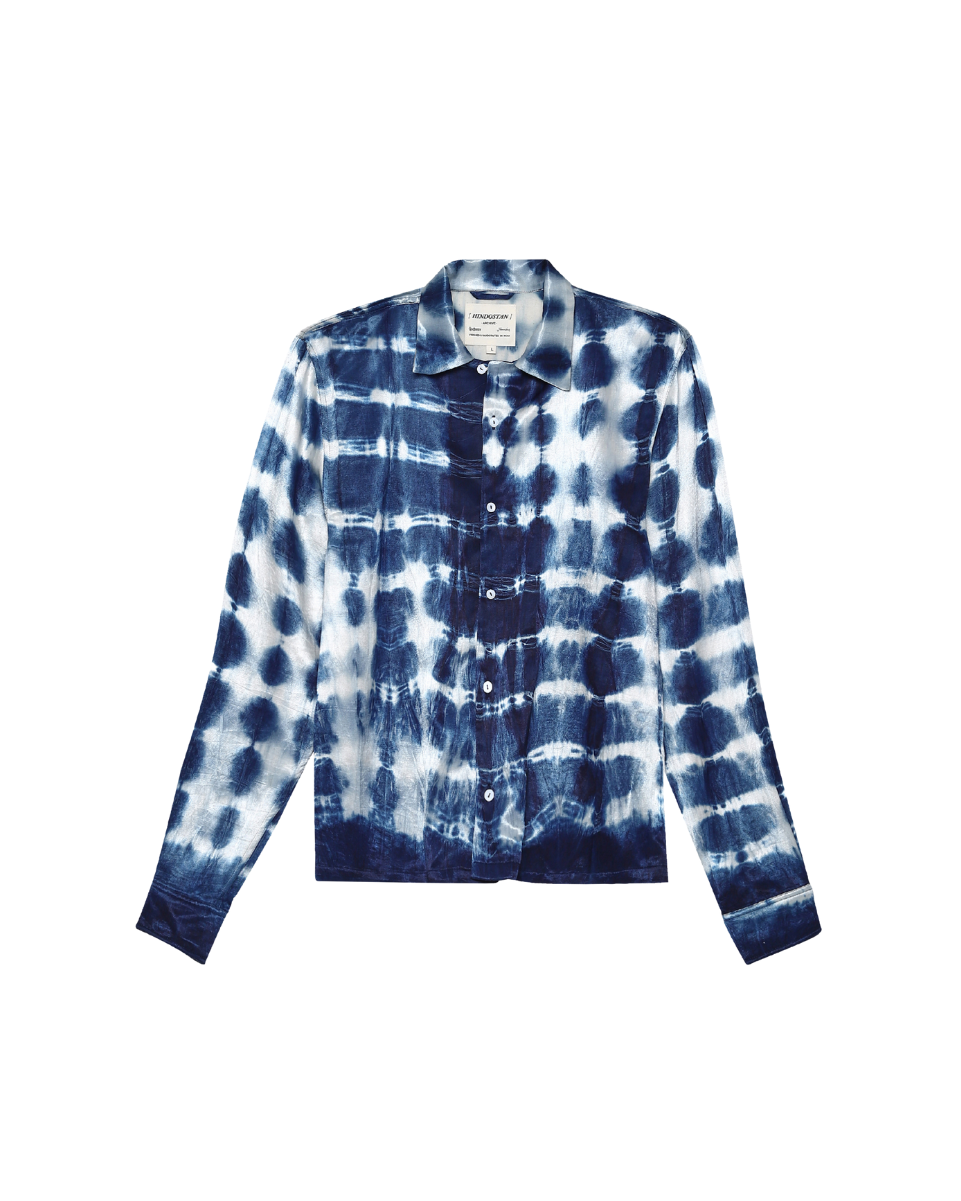 Blue and white tie-dye shirt on a white background