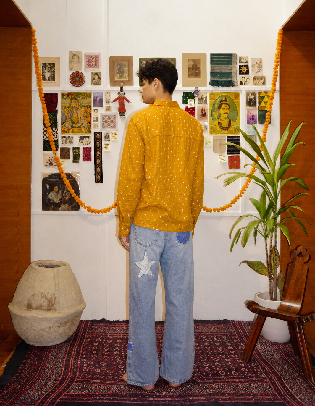 Model wearing Bandhani mustard cotton shirt back view lifestyle – Indian handloom natural dyed artisan menswear by Hindostan Archive