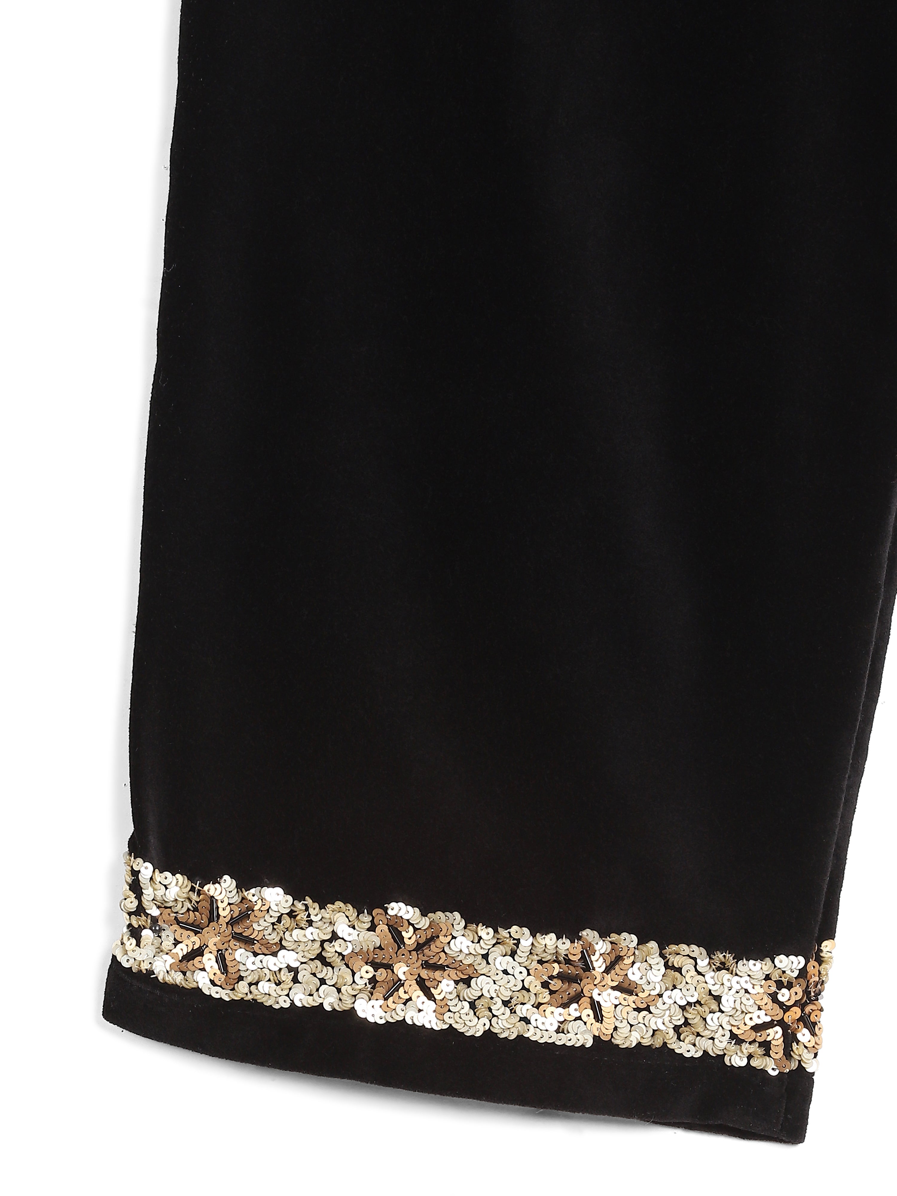 Black velvet trousers sequin floral embroidery hem close-up – artisan menswear Indian handloom clothing by Hindostan Archive