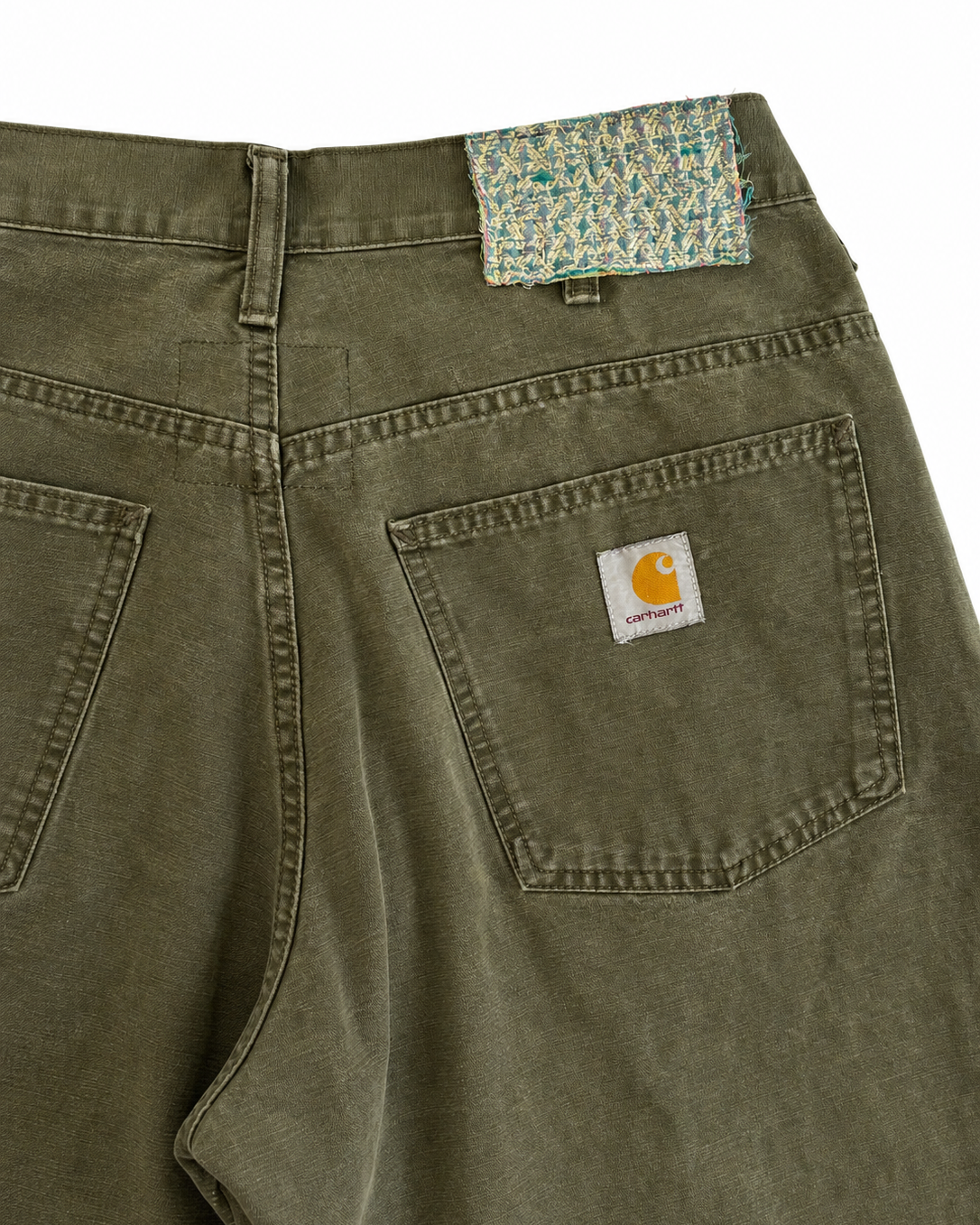 Back pocket detail of Carhartt upcycled denim jorts with Zardozi hand embroidery and Kantha patch – Hindostan Archive artisan menswear