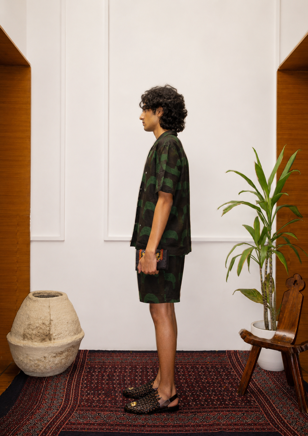 Crescent Ajrakh shorts model side view – Ajrakh clothing hand block printed natural dyed shorts – artisan menswear Indian handloom by Hindostan Archive