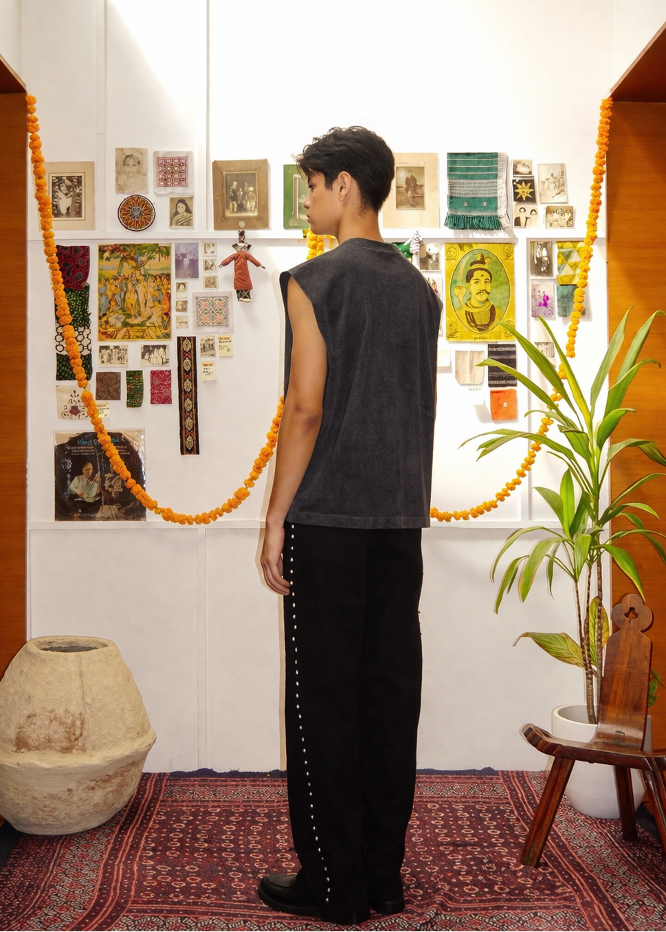 Model wearing Distressed Bengal Tiger graphic tank top vest back view – Indian artisan menswear by Hindostan Archive