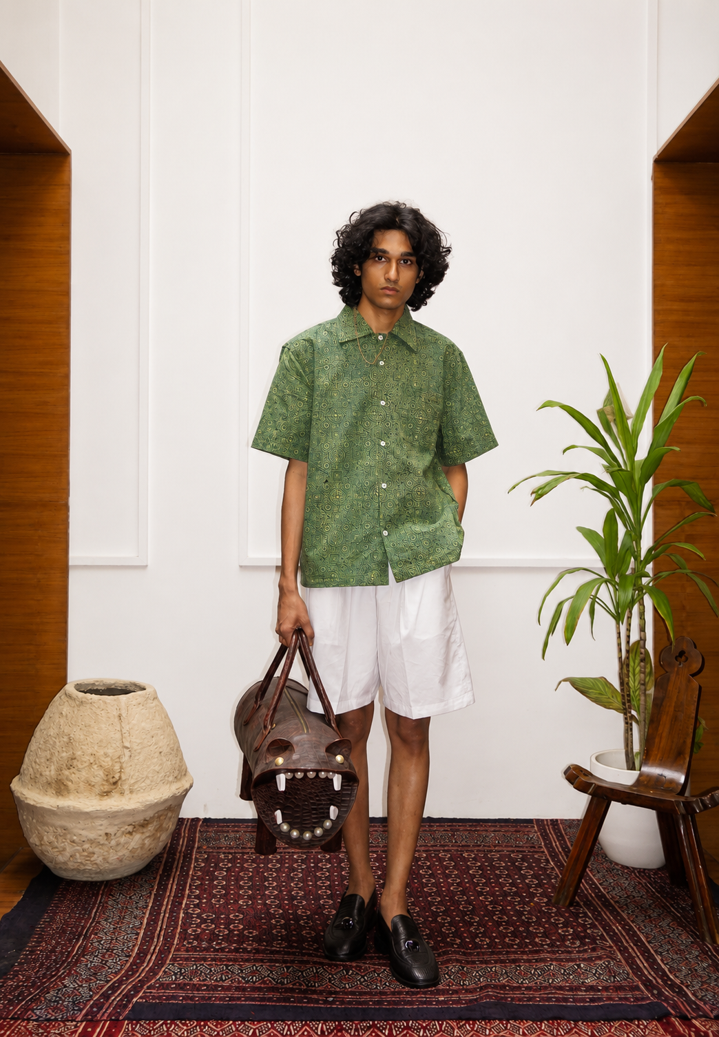 Model wearing Harit Ajrakh handblocked shirt – Ajrakh clothing hand block printed shirt green natural dyed – artisan menswear Indian handloom by Hindostan Archive