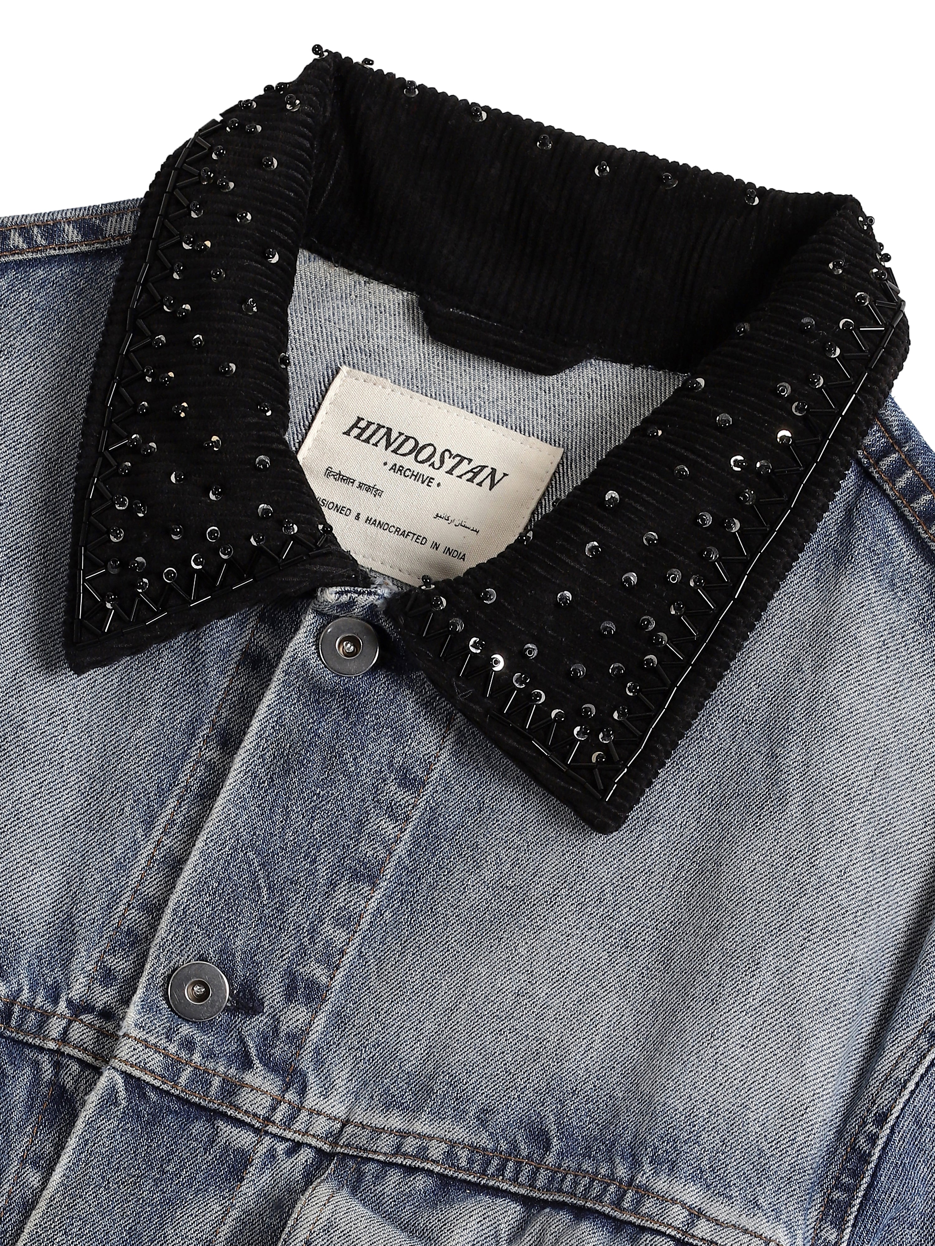 Indigo denim jacket embroidered collar close-up with Hindostan Archive label – natural dyed artisan menswear