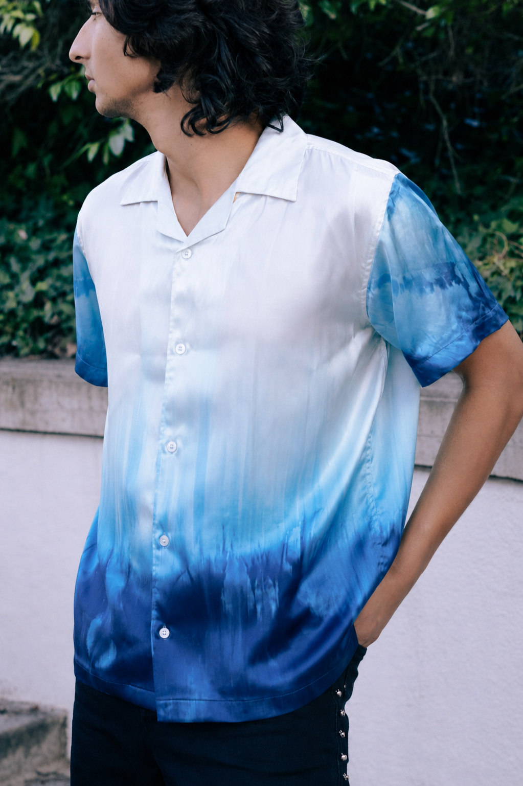 Model wearing OMBRE Mashru silk blue tie-dye camp shirt outdoors – Hindostan Archive artisan menswear