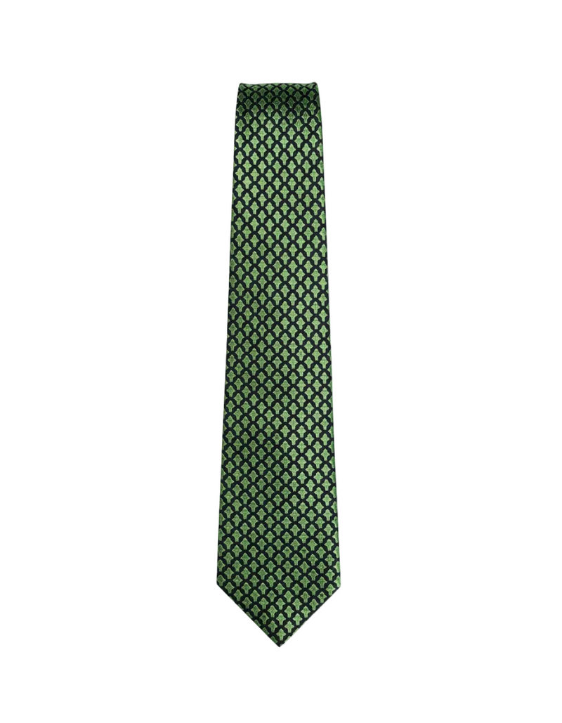 Green patterned tie on a white background