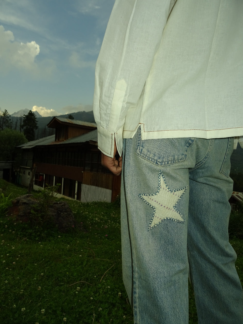 Vintage patchwork jeans outdoor lifestyle shot – artisan menswear natural dyed clothing Indian handloom by Hindostan Archive